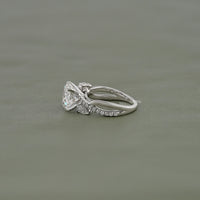 Round Cut Three Stone Twisted Accent Ring