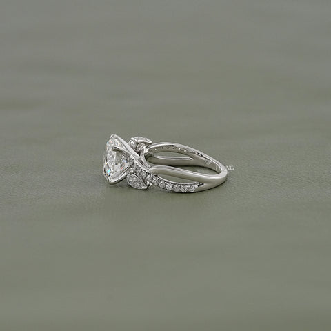 Round Cut Three Stone Twisted Accent Ring