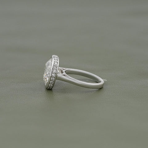 Round Cut Bezel Set Hidden Halo Engagement Ring