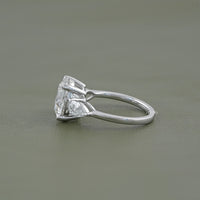Round Cut Diamond Three Stone Ring With Pear Side Stones
