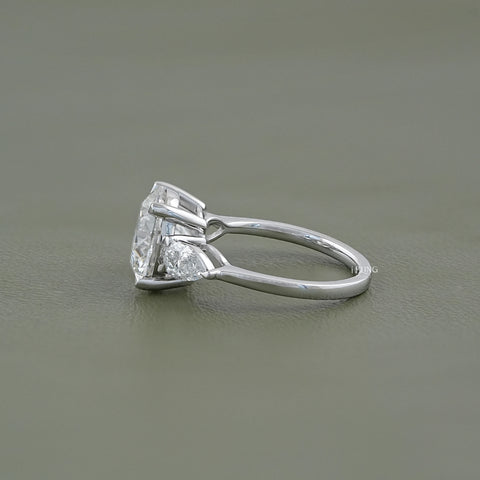 Round Cut Diamond Three Stone Ring With Pear Side Stones