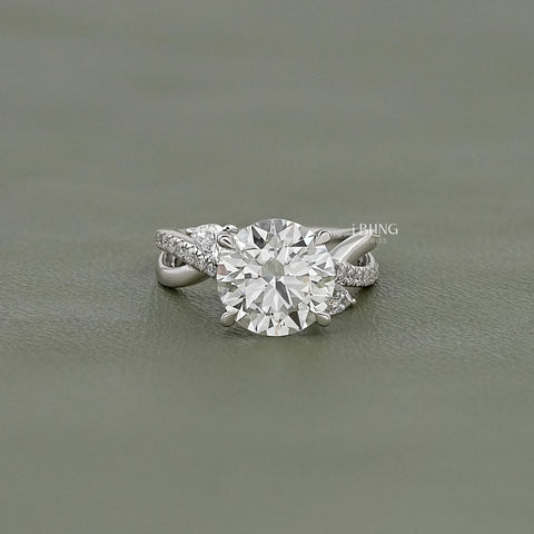Round Cut Three Stone Twisted Accent Ring