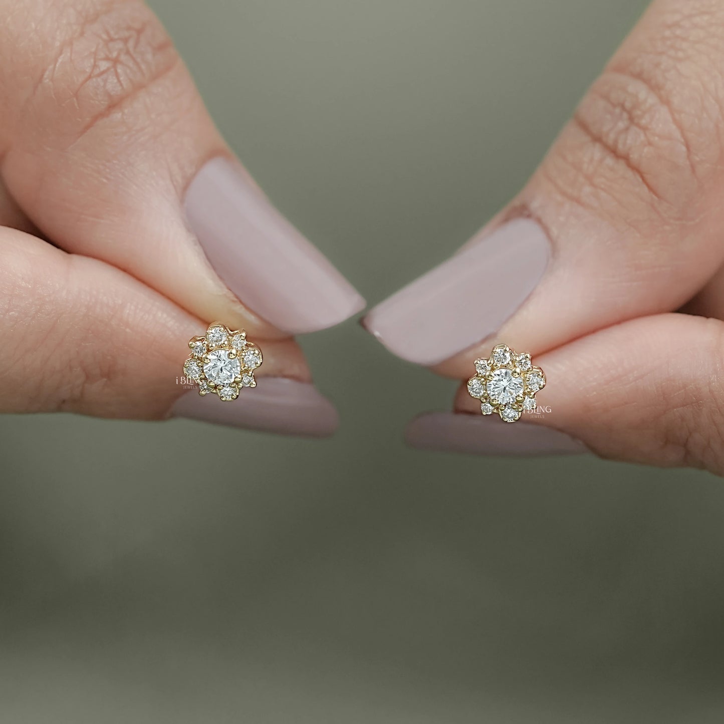 Front view floral style earrings crafted with round lab diamond halo design