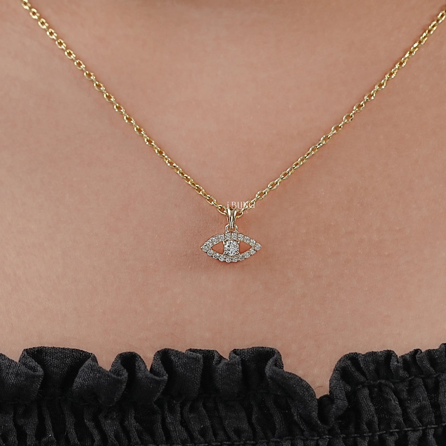 Woman neck evil eye pendant styled with round lab diamond center