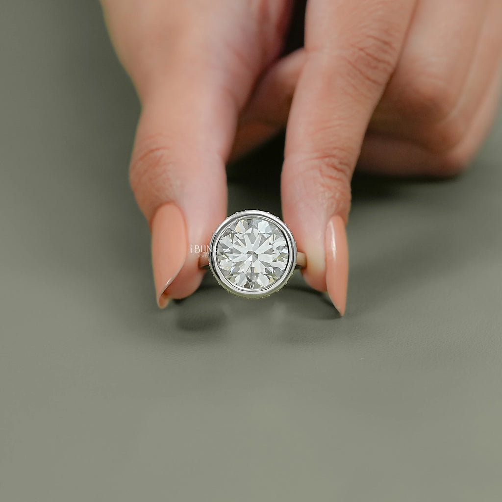 Round Cut Bezel Set Hidden Halo Engagement Ring