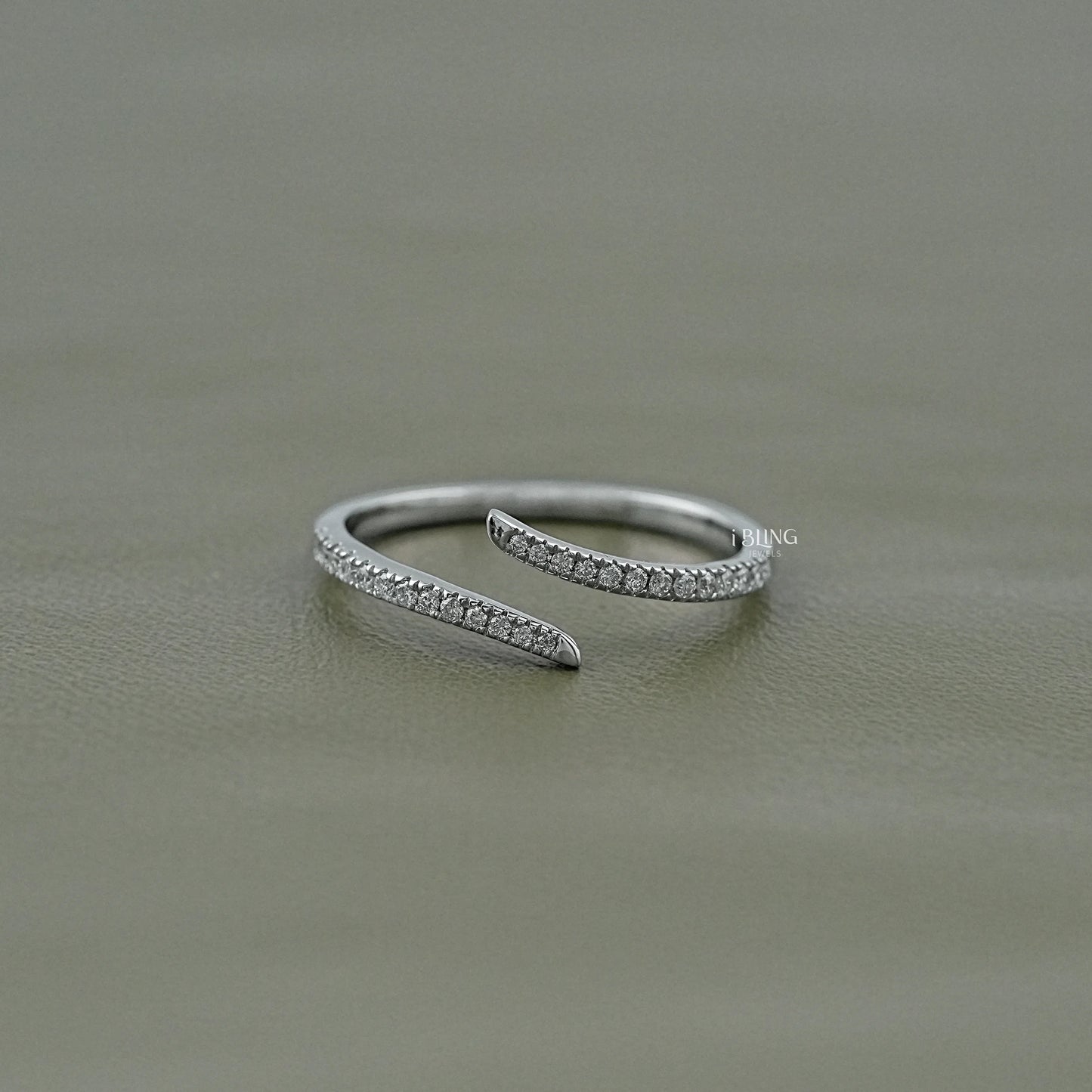 Ibling Jewels open bypass ring with brilliant round lab-grown diamonds in a 14k solid gold sleek frame.