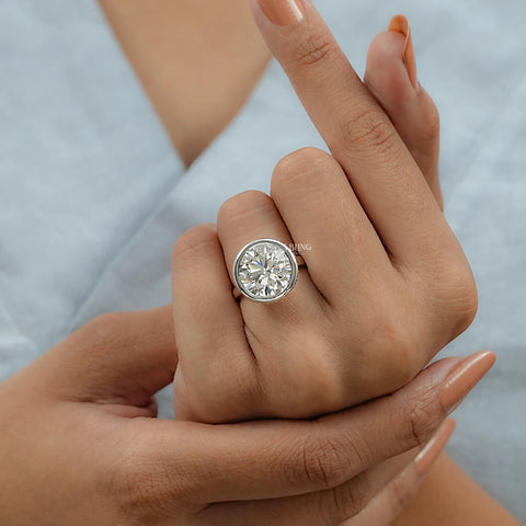 Round Cut Bezel Set Hidden Halo Engagement Ring