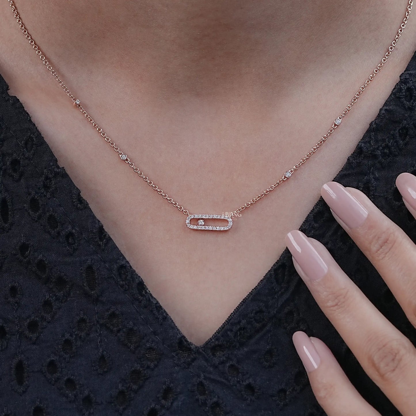 Woman wearing paper clip necklace gold styled for everyday jewelry looks