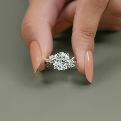 Round Cut Three Stone Twisted Accent Ring