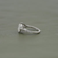 Round Cut Diamond Bypass Accent Engagement Ring