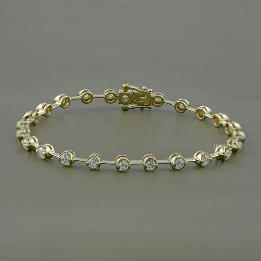 iBling Jewels moissanite tennis bracelet 14k gold with a secure and sleek bezel setting.