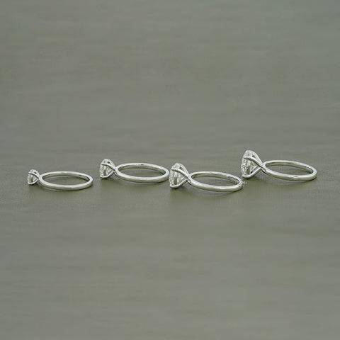 Four Prong Setting Round Moissanite Solitaire Ring