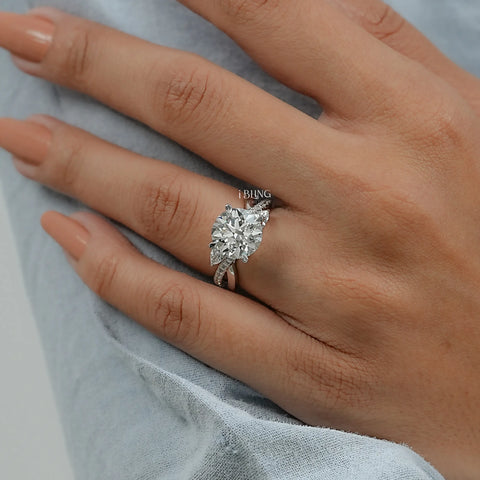 Round Cut Three Stone Twisted Accent Ring