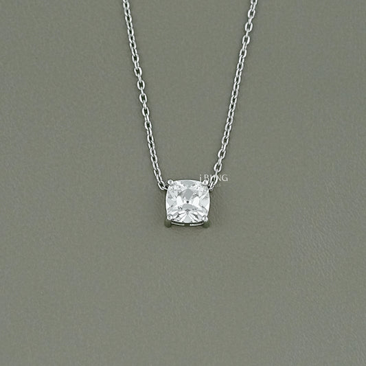 iBling Jewels old mine cut diamond solitaire necklace in a minimalist four-prong gold setting.
