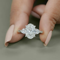 Three Stone Oval Diamond Engagement Ring
