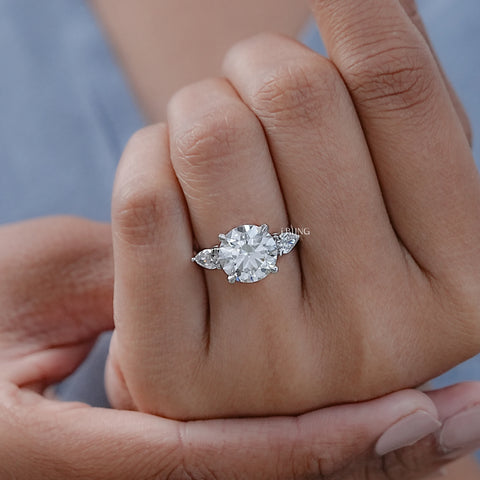 Round Cut Diamond Three Stone Ring With Pear Side Stones