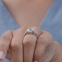 Round Cut Diamond Three Stone Ring With Pear Side Stones