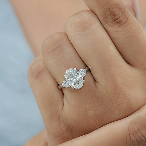Three Stone Oval Diamond Engagement Ring