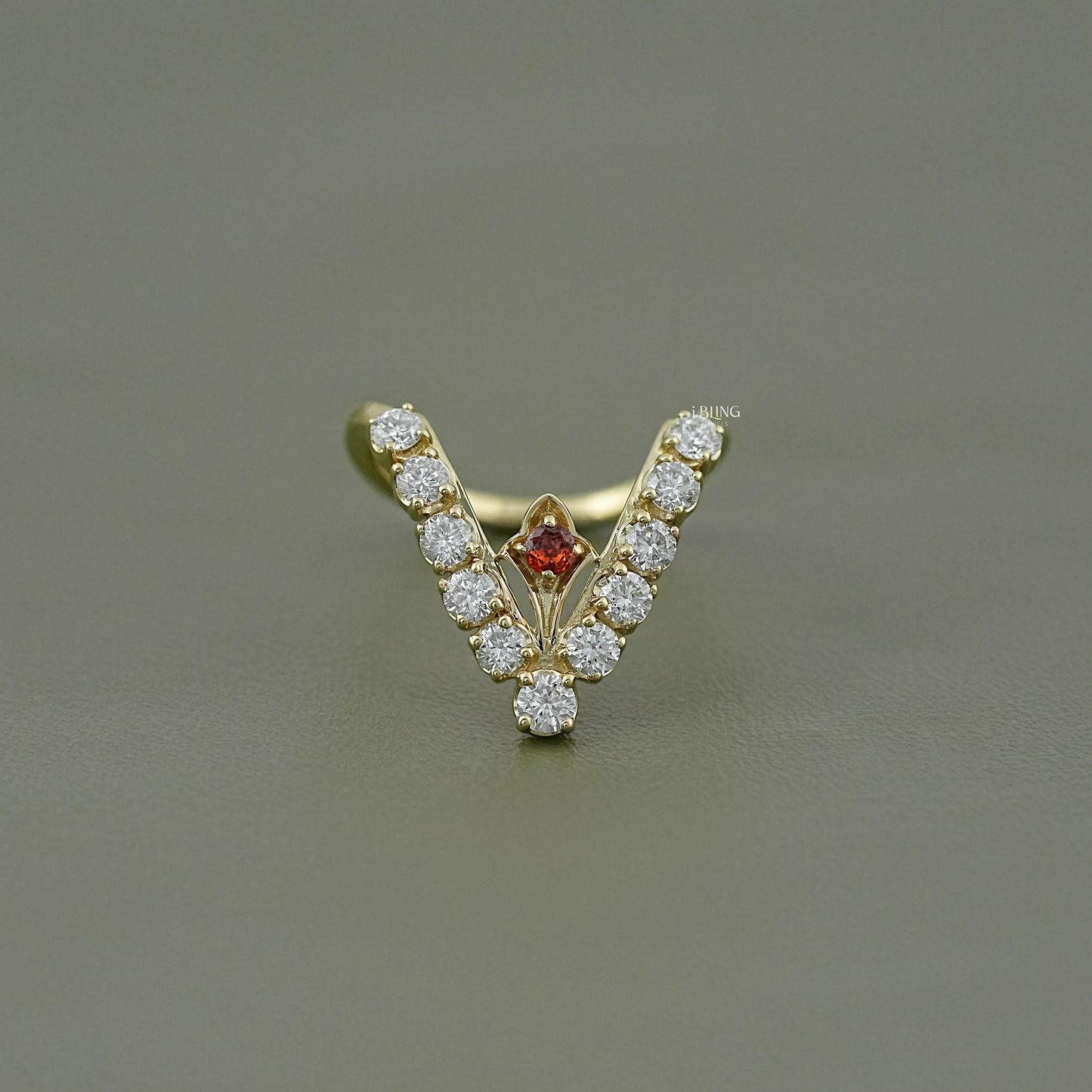 iBling Jewels ruby with diamond ring featuring a unique V-shaped wishbone design in yellow gold.